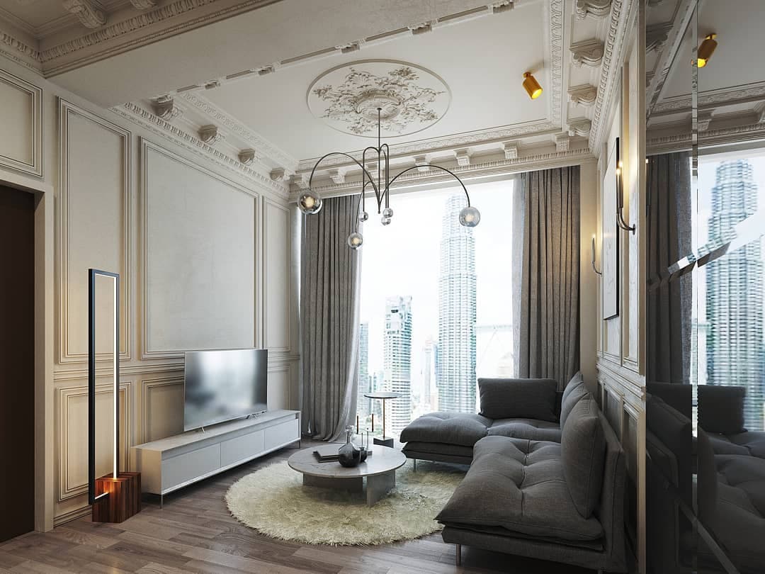 High-rise living room with classical wall panelling, a grey sectional and floor-to-ceiling views of city towers